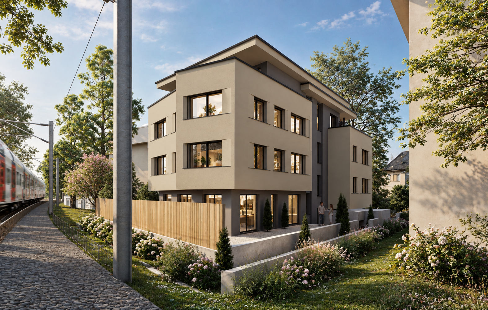 Mehrfamilienhaus Baar, Rückansicht mit Gartenbereich und Blumenrabatten